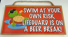 Load image into Gallery viewer, Swim at Your Own Risk Lifeguard is On A Beer Break Wooden Sign
