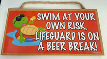 Load image into Gallery viewer, Swim at Your Own Risk Lifeguard is On A Beer Break Wooden Sign
